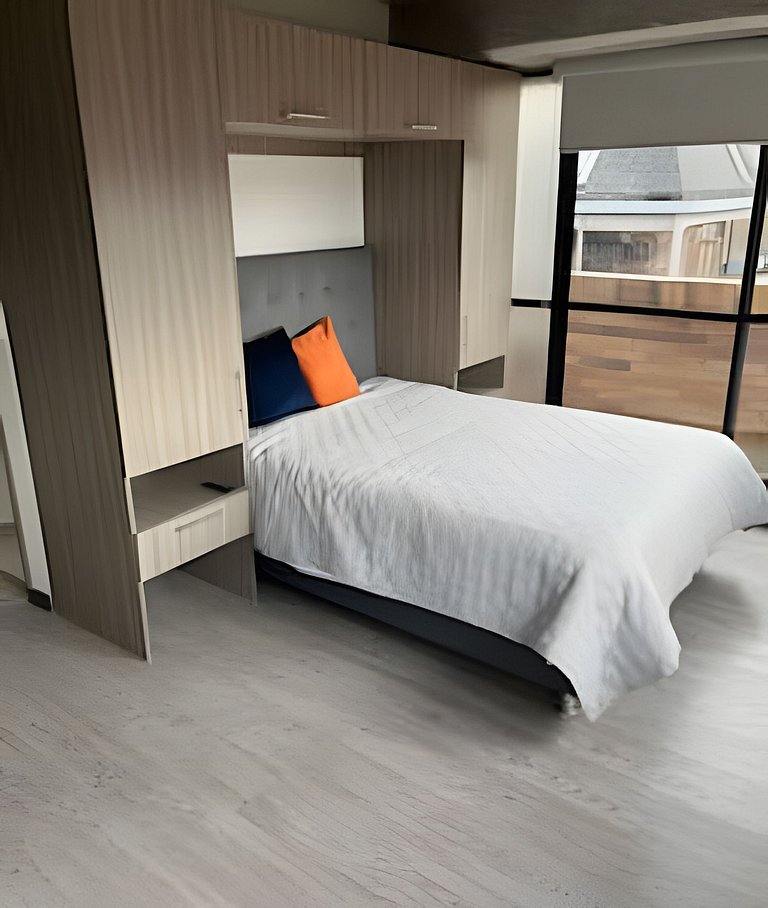Estudio con Gran Vista y Balcon